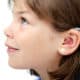 child with hearing aid