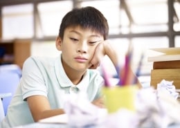 Bored looking child in classroom